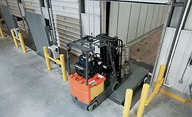 Automated loading dock equipment