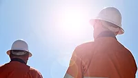 Workers in rising summer heat