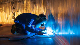 A welder in a confined space