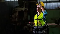 WBGT meter worker with a WBGT meter