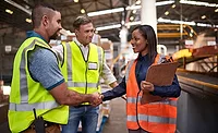 Construction workers in a discussion