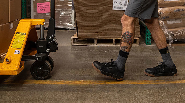 warehouse employee wearing safety footwear