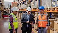 supervisor gives feedback to employees