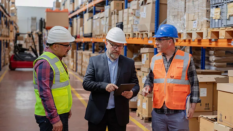 supervisor gives feedback to employees