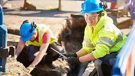 female construction worker wearing PPE