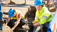 female construction worker wearing PPE