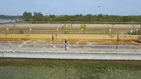 worker in a wastewater treatment facility