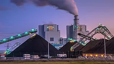a coal-fired power station, a type of industrial facility that burns coal to produce electricity a coal-fired power station, a type of industrial facility that burns coal to produce electricity