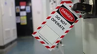 This is a lockout tagout (LOTO) safety tag used to prevent machinery from being energized during maintenance This is a lockout tagout (LOTO) safety tag used to prevent machinery from being energized during maintenance
