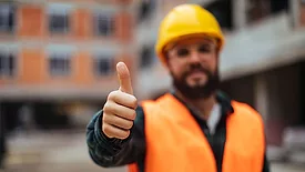 construction worker giving thumbs-up